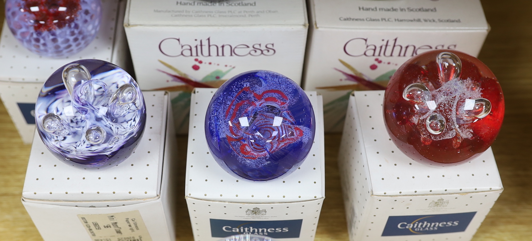 Ten Caithness paperweights, boxed, some limited edition